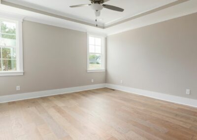 Before and after of a water-damaged ceiling repaired and retextured by Powell Property Services in Lakeland, FL.